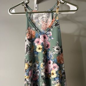 Floral Spaghetti Strap Dressy top size small fits like a medium